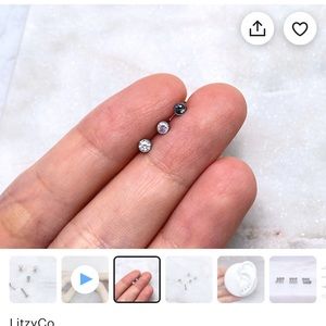 Two pairs of grade titanium earrings.